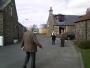 Menzies Campbell seems to be dancing down the street in the Wynd,Dunshalt,Fife. Out campaigning with local councillor Donald Lothian.