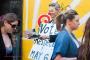 A Respect Party campaigner gives out leaflets in Brick Lane wearing a Tony Blair mask. Respect was born off the anti-war movement; no one seems to have told them that Blair is no longer in.