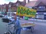 Sid Phelps riding a bicycle with a ‘Vote Green’ trailer attached.