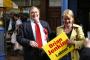 John Prescott sharing a joke with a local Labour party supporter in the centre of Tamworth.