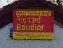 A poster for Richard Boudier (Labour for Ceredigion) located in the village of Ffosyffin in the constituency