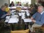 Liberal Democrat party workers in Hendon Committee room preparing target letters to electors