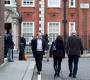 Vince Cable with aide walking to the Liberal Democrats HQ on Cowley Street in London.