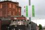 A Sinn Fein poster outside the Mount Pottinger PSNI Station in the Nationalist Short Strand area of East Belfast. The station was closed a couple of months ago but the paint splatters were there long before it closed. Northern Ireland.