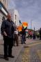 Labour supporters wave banners opposite the Plaid Cymru rally in Aberystwyth.