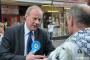 Conservative Shadow Minister Damian Green MP speaking with local market trader in Dudley Monday 26 April. Photograph by Paul C Wynn.