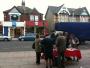 A rather amusing scene on Saturday in Portslade where Labour MP Celia Barlow (in black & white checked suit) had set up a stall canvassing shoppers outside Tesco Metro on Station Road, in full view of the Tory campaign HQ (above D&A opticians) of her rival Mike Weatherley. Staff can be seen in Weatherley's office manning the phones.