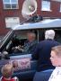 Ian Paisley Snr in his son's campaign car (Paisley Jnr was campaigning for the DUP in North Antrim, where his father had recently stood down as MP). Paisley can be seen signing a bible for a local resident in Ballymena, County Antrim. 3rd May 2010.