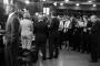 Journalists listen in on a Sky TV interview with a number of politicians in the Spin Room after the final Leader's Debate. Birmingham University, 29th April 2010.