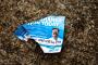 A Conservative Party campaign leaflet crumpled on the floor.